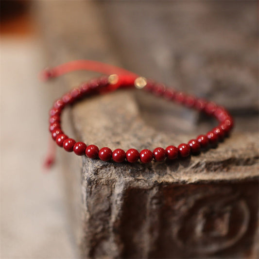 Pulsera trenzada de hilo rojo con bendición de cinabrio natural y piedras de Buda