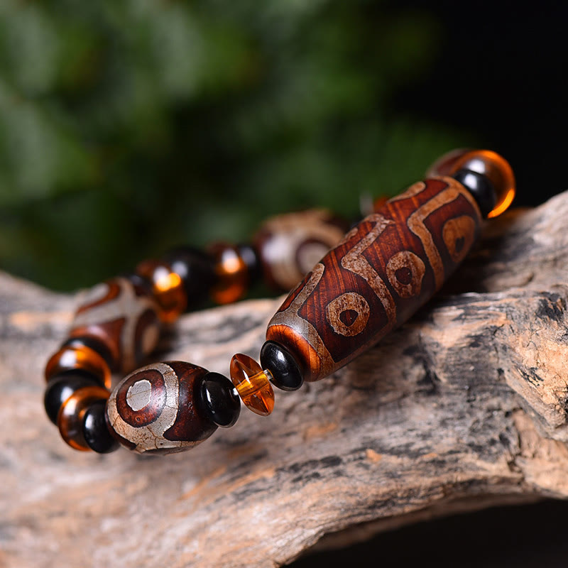 Pulsera tibetana retro de cuentas Dzi de nueve ojos con bendiciones de piedras de Buda
