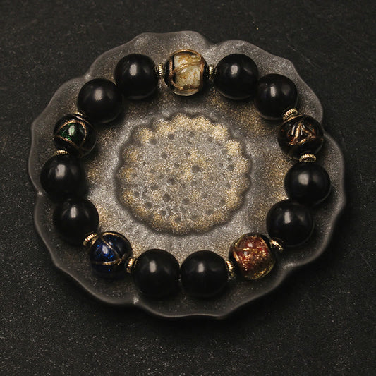 Pulsera de la riqueza con cuentas de vidrio de Liuli, ceniza de incienso y jaboncillo occidental de Buddha Stones
