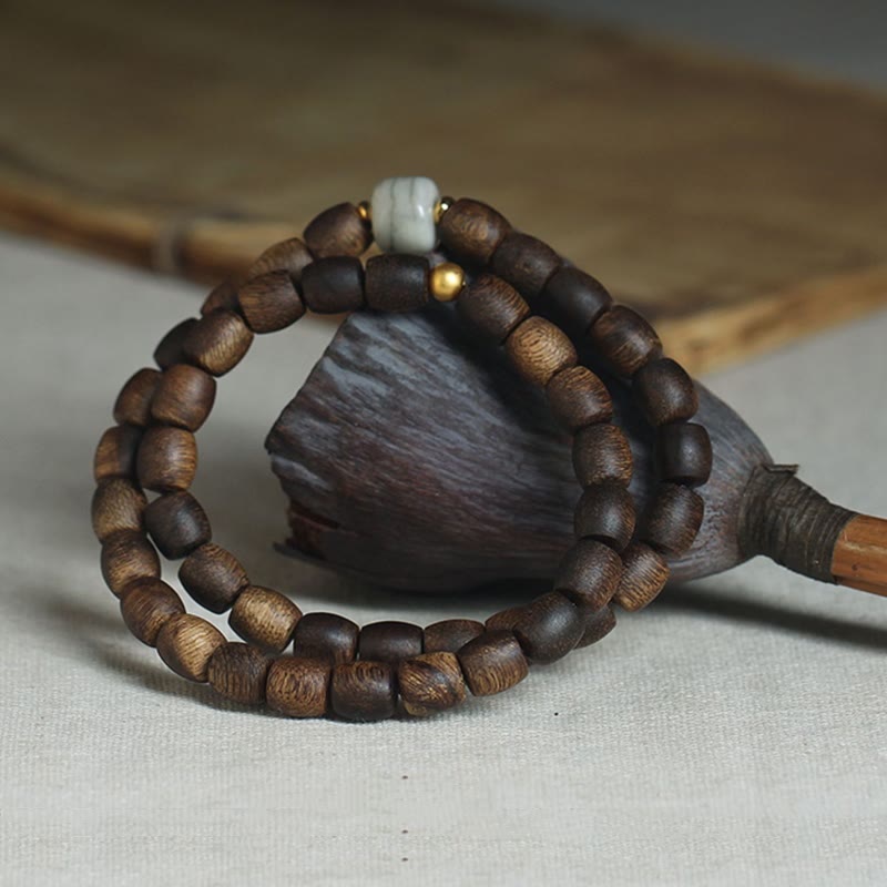 Buddha Stones 999 Gold Seltenes Tarakan-Adlerholz Tibetischer Alter Geistknochen Gleichgewicht Stärke Doppelwickelarmband