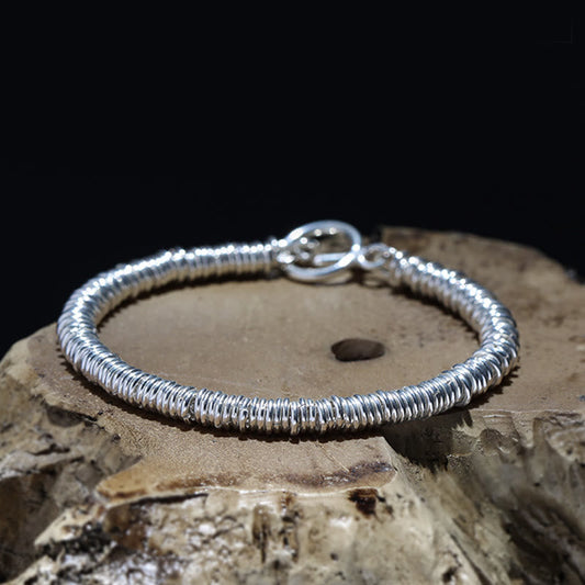 Pulsera de la suerte con diseño circular simple de piedras de Buda