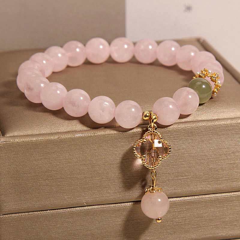Pulsera relajante de trébol de cuatro hojas de cristal rosa natural de Buddha Stones