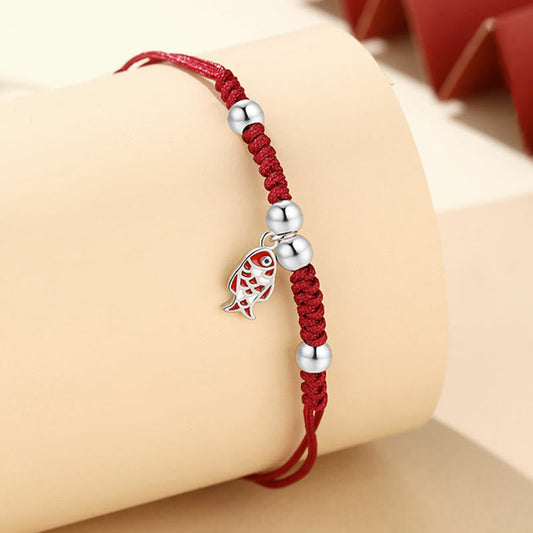 Pulsera trenzada roja artesanal de plata de ley 925 con piedras de Buda y pez koi para la suerte y la riqueza.