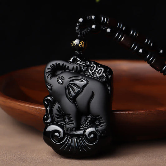 Collar con colgante y llavero de obsidiana negra con protección de elefantes