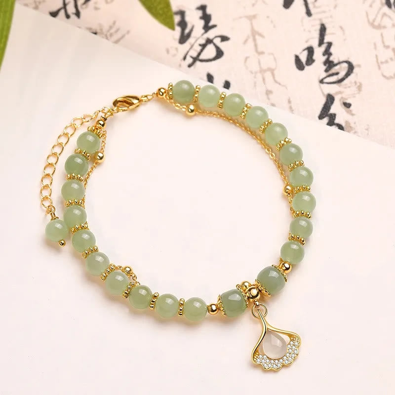 Pulsera de cuentas con piedras de Buda, hojas de jade, ginkgo, tulipán, cacahuete y carácter Fu, con la suerte