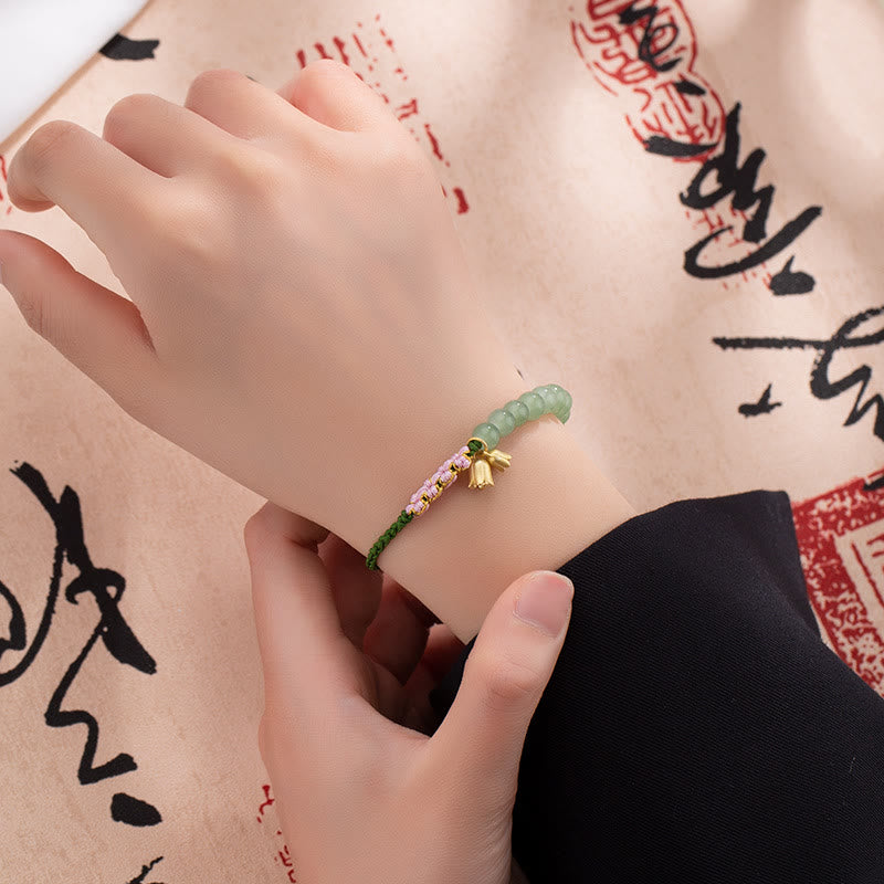 Pulsera trenzada con cuentas de jade de Buda, hecha a mano, con amuleto de lirio de los valles y la suerte