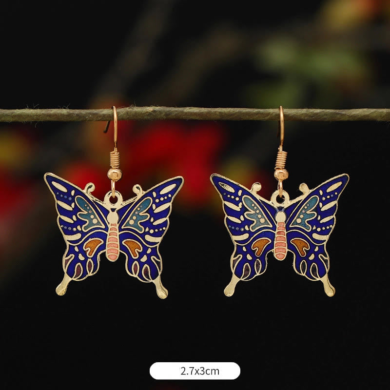 Pendientes colgantes de cobre con diseño de flor de loto y mariposa de Buda y piedras de iluminación