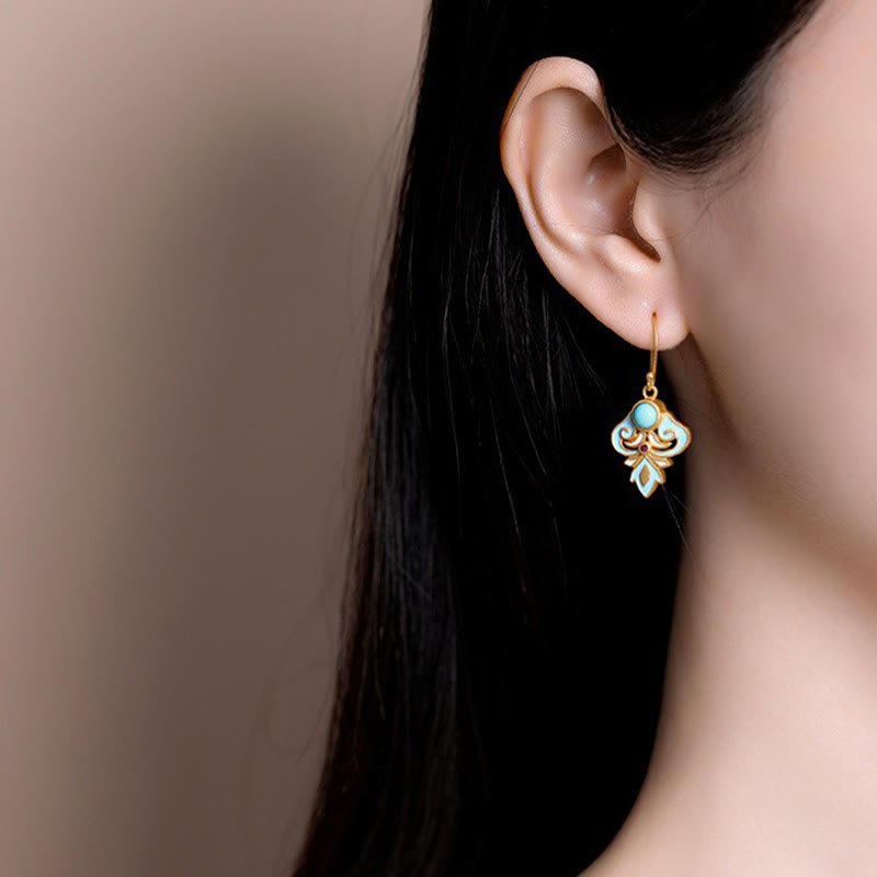 Pendientes colgantes con turquesa, esmalte y cobre de Buddha Stones