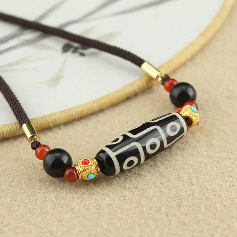 Collar con colgante de hilo con cuentas Dzi tibetanas de nueve ojos y piedras de Buda con bendiciones de protección