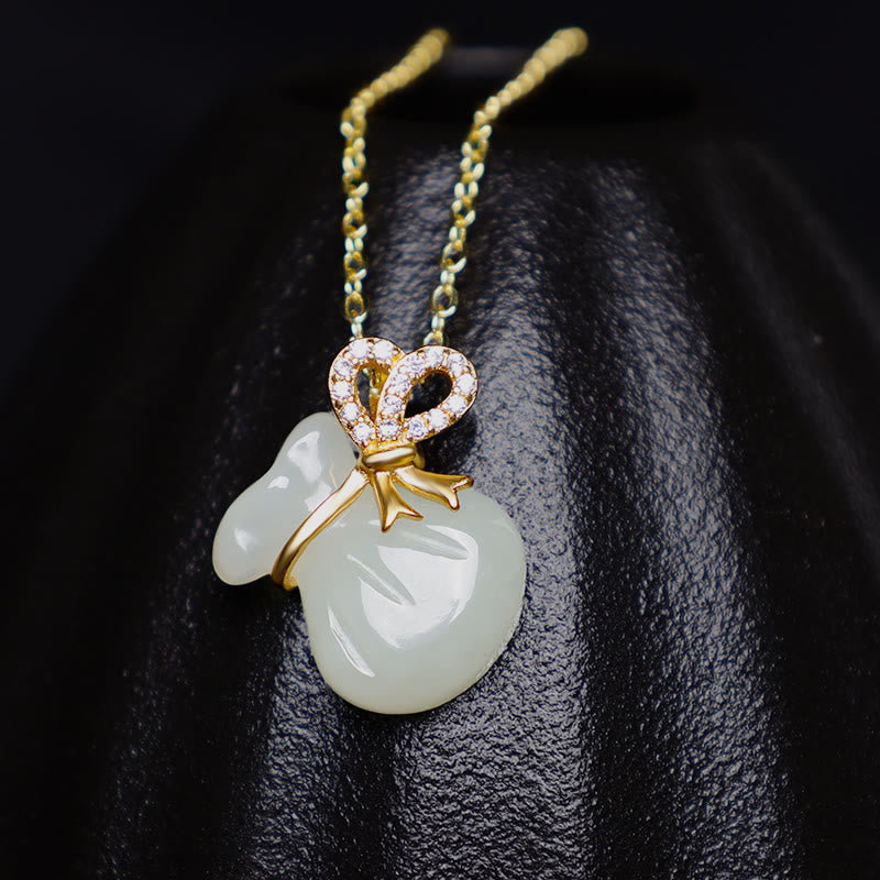Colgante de jade blanco hetiano natural con piedras de Buda y bolsa de dinero de la suerte