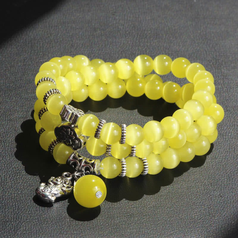 Pulsera triple vuelta con soporte PiXiu de ojo de gato y piedras de Buda