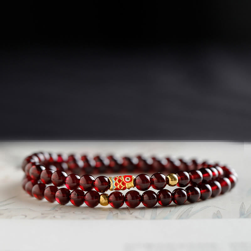 Buddha Stones 999 Gold Koi Fisch Natur Granat Schutzarmband