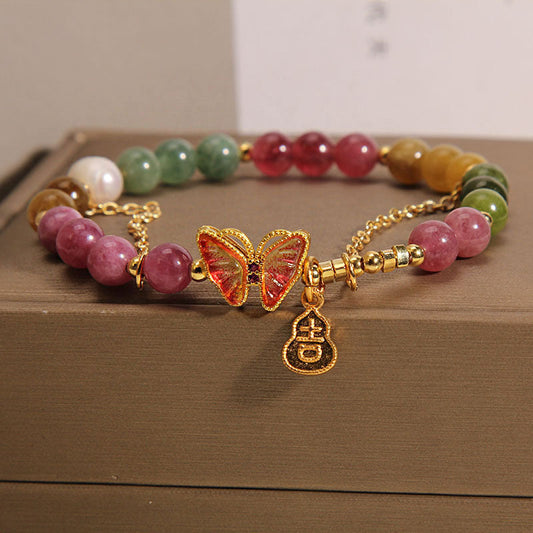 Pulsera positiva con dije de calabaza de turmalina natural colorida y mariposa de Buda
