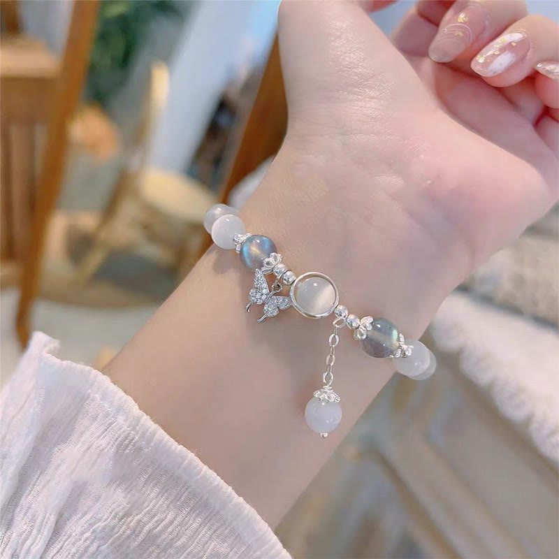 Pulsera de soporte con dije de estrella y mariposa con piedra lunar y ojo de gato de Buddha Stones
