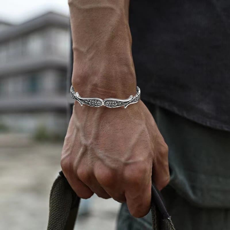 Brazalete de la suerte tallado con alas de ángel y plumas de Buda