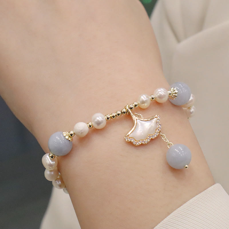 Pulsera con dije de mariposa, hoja de ginkgo y perla de aguamarina natural de Buda