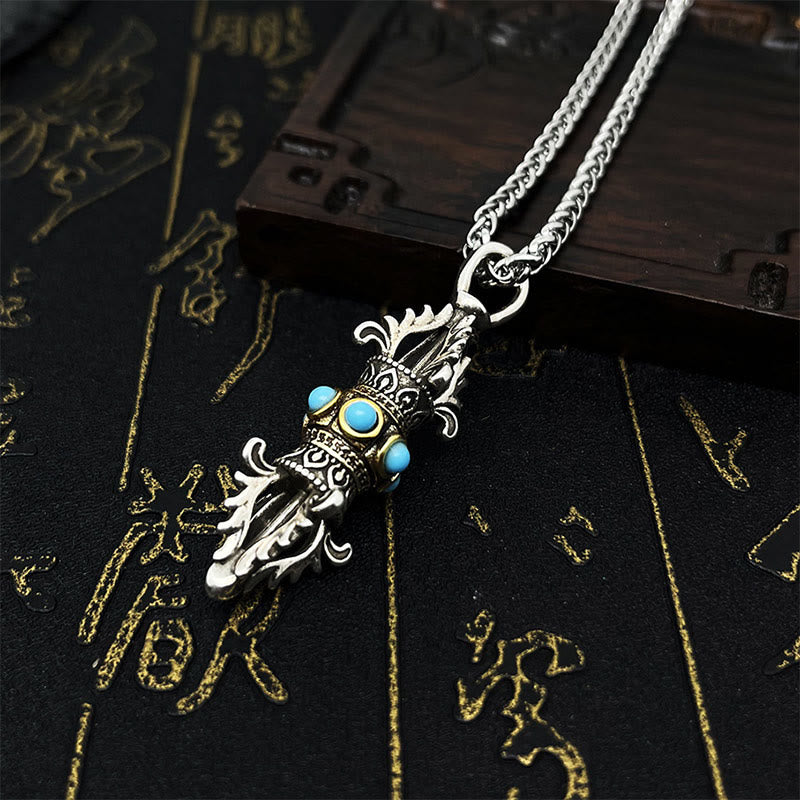 Collar con colgante de metal de cobre con diseño de dorje vajra tibetano y piedras de Buda.