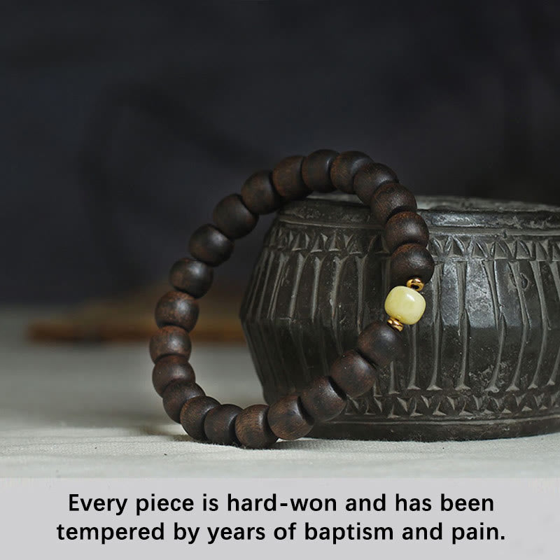 Buddha Stones Seltenes Brunei-Adlerholz-Bernstein-Armband mit Balance, Frieden und Ruhe