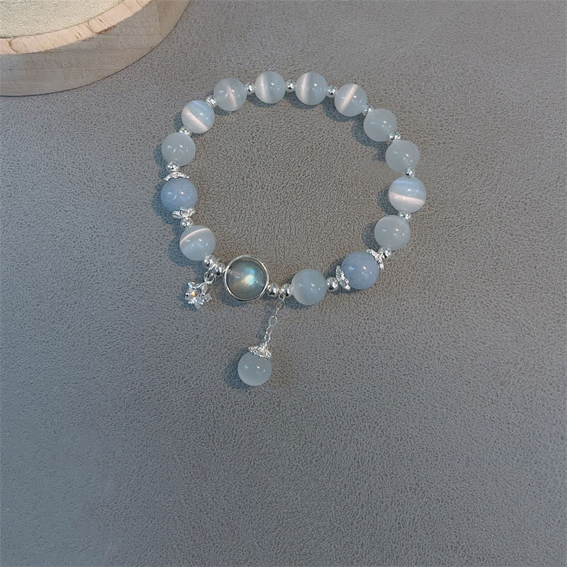 Pulsera de soporte con dije de estrella y mariposa con piedra lunar y ojo de gato de Buddha Stones