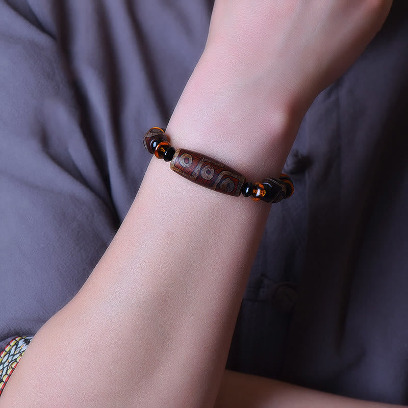 Pulsera tibetana retro de cuentas Dzi de nueve ojos con bendiciones de piedras de Buda