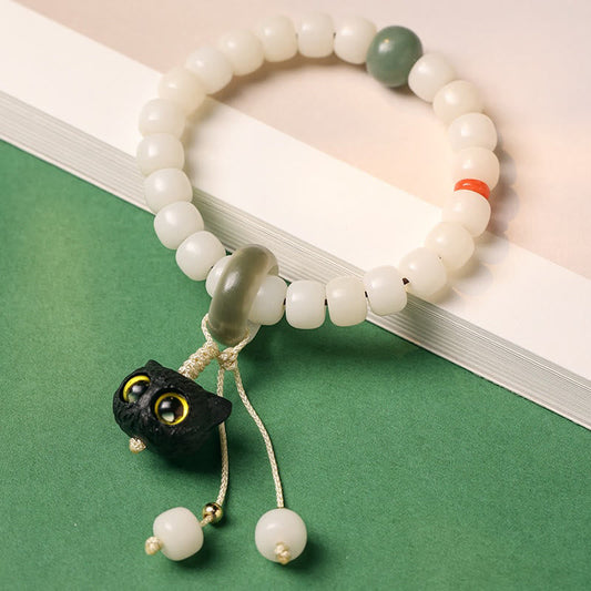 Pulsera de piedra de Buda con semillas naturales de bodhi y madera negra africana con encanto de gato, armonía y paz.