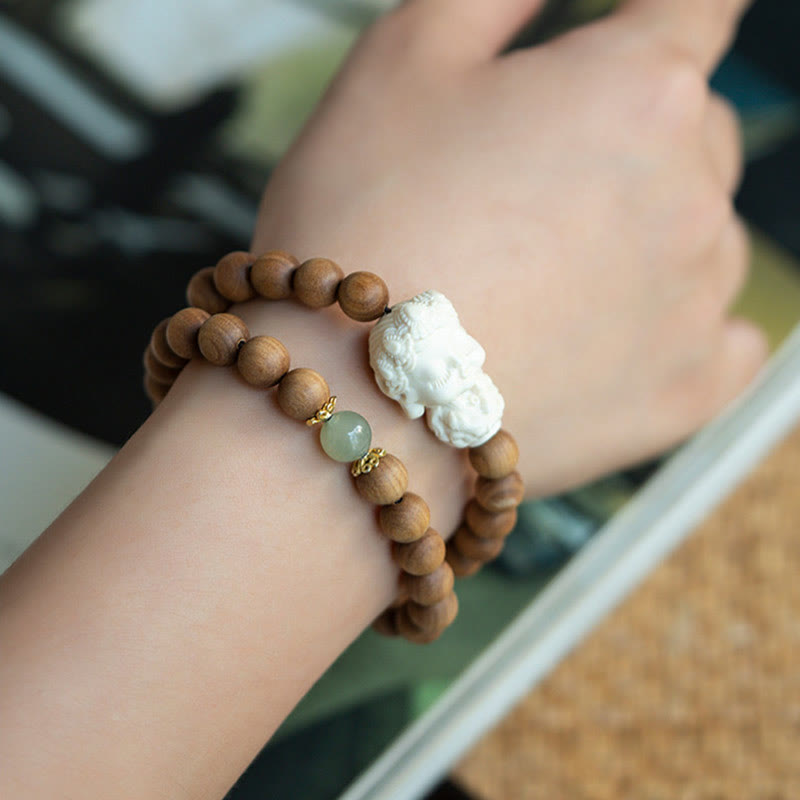 Pulsera protectora de piedras de Buda, sándalo, jade hetiano, marfil y fruta de Tara verde