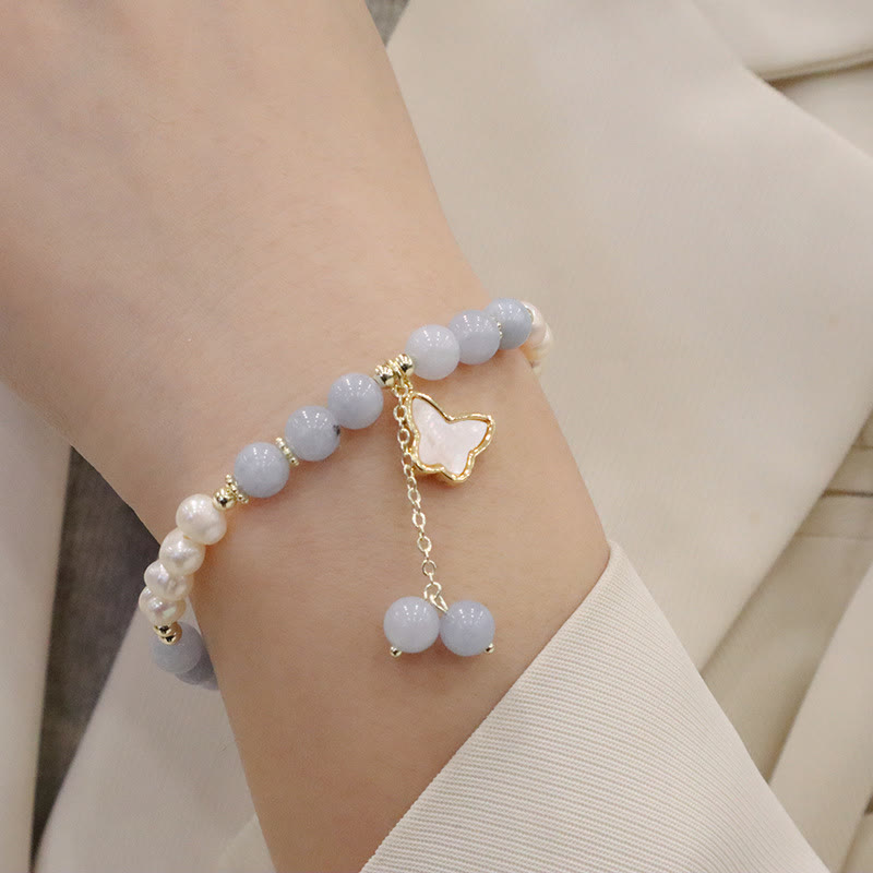 Pulsera con dije de mariposa, hoja de ginkgo y perla de aguamarina natural de Buda