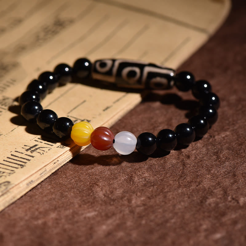Pulsera tibetana de cuentas Dzi de nueve ojos con piedras de Buda y poder de la riqueza