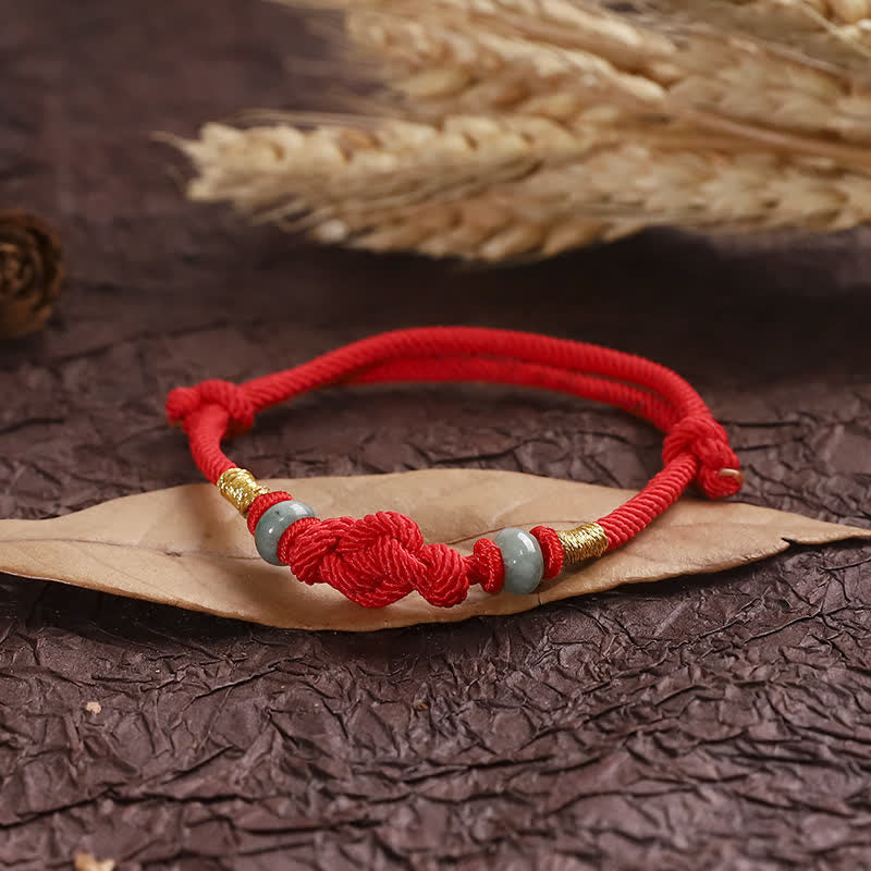 Pulsera trenzada con nudo de la fortuna y jade rojo de Buda