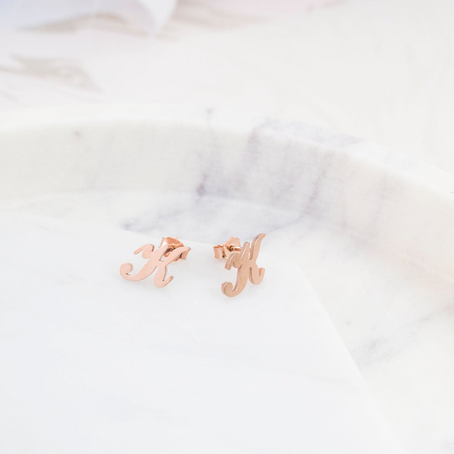 Pendientes con iniciales de Alex