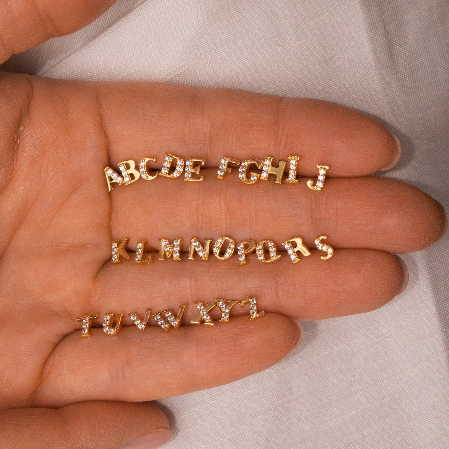 Tachuelas iniciales pavé