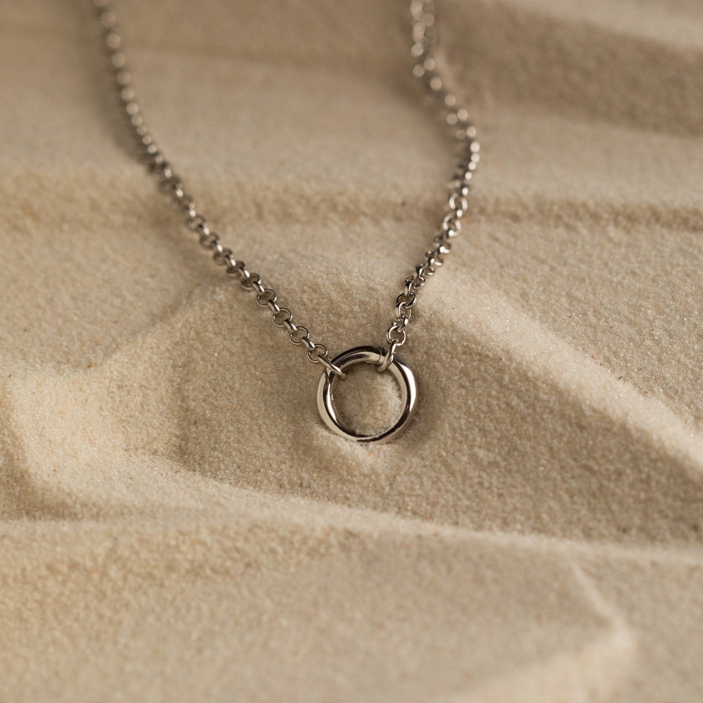 Collar con dije circular Rolo