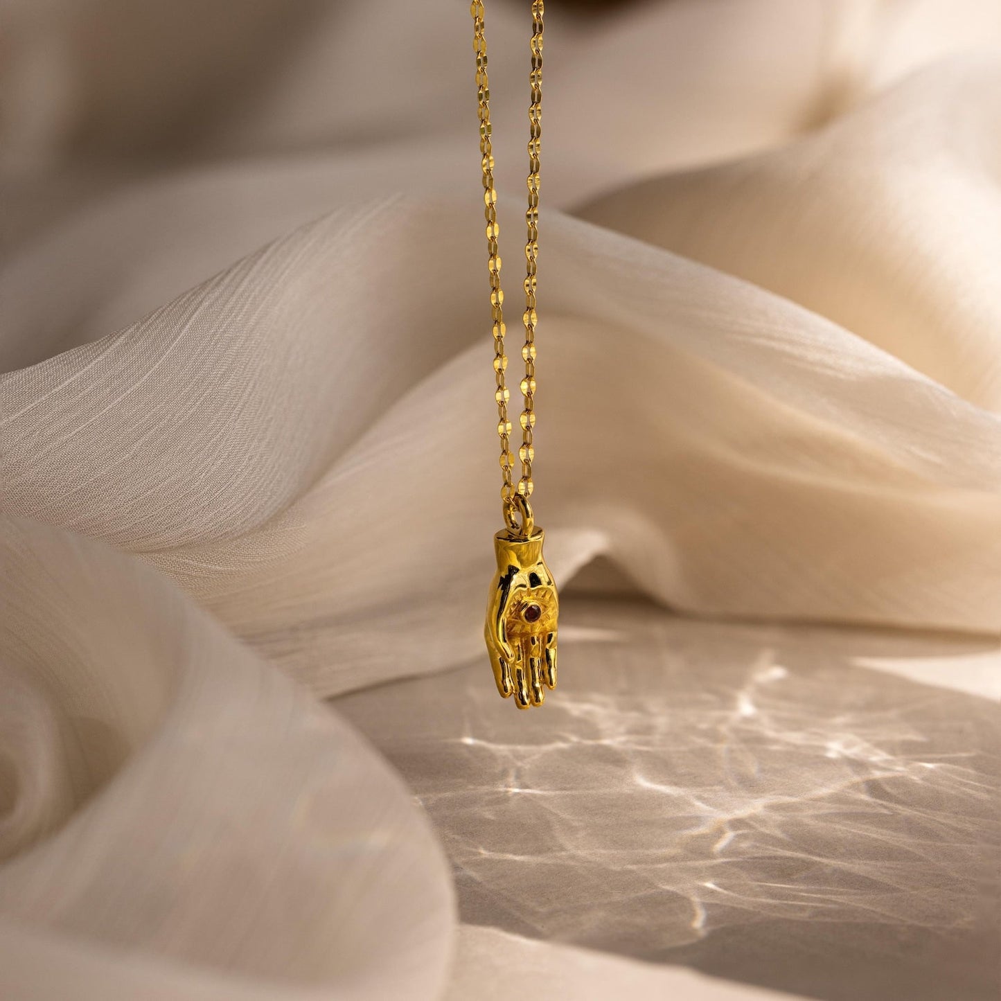 Collar de mano con piedra de nacimiento y mal de ojo