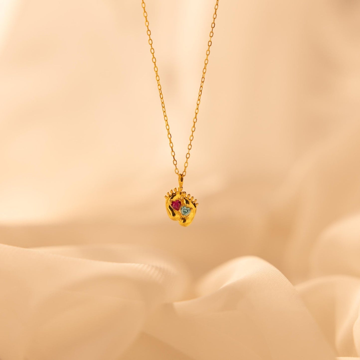 Collar con piedra de nacimiento y huella