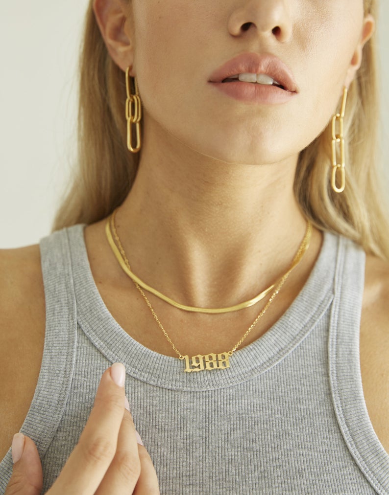 Collar del año de nacimiento de Talia