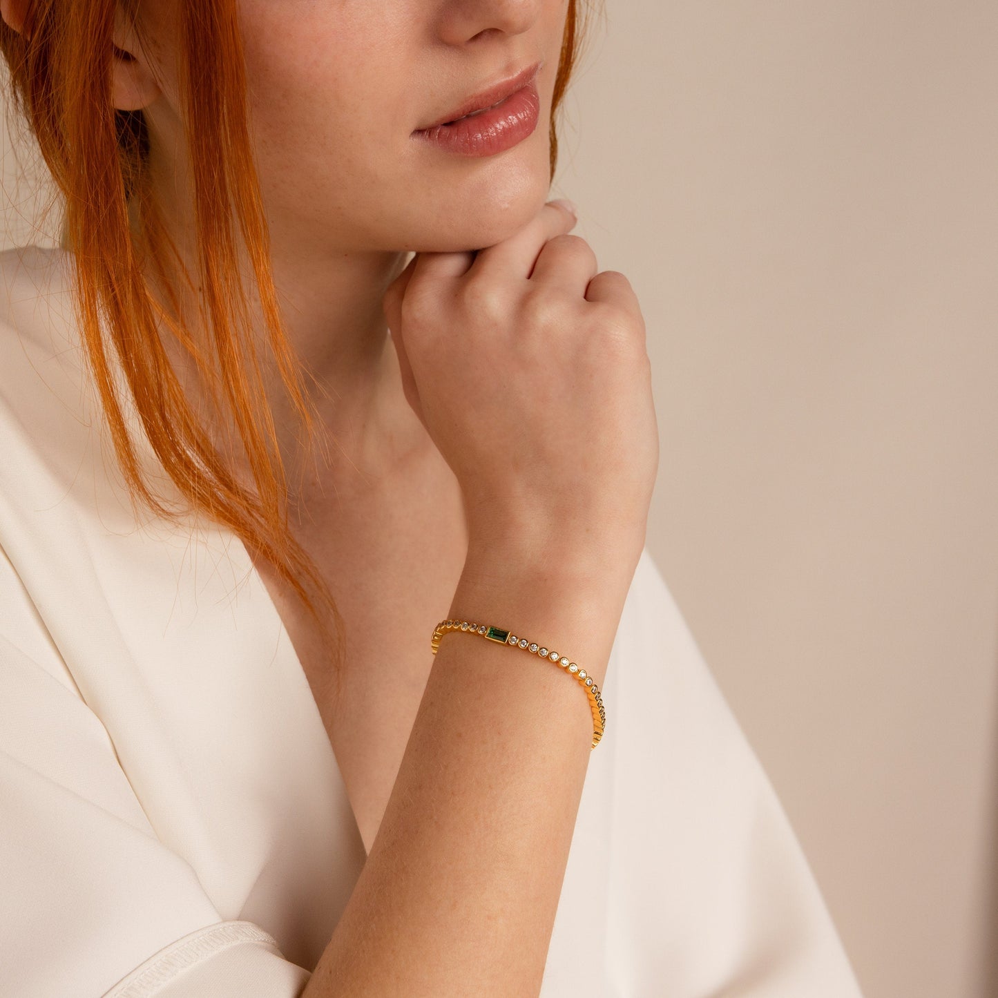 Pulsera de tenis con esmeralda baguette