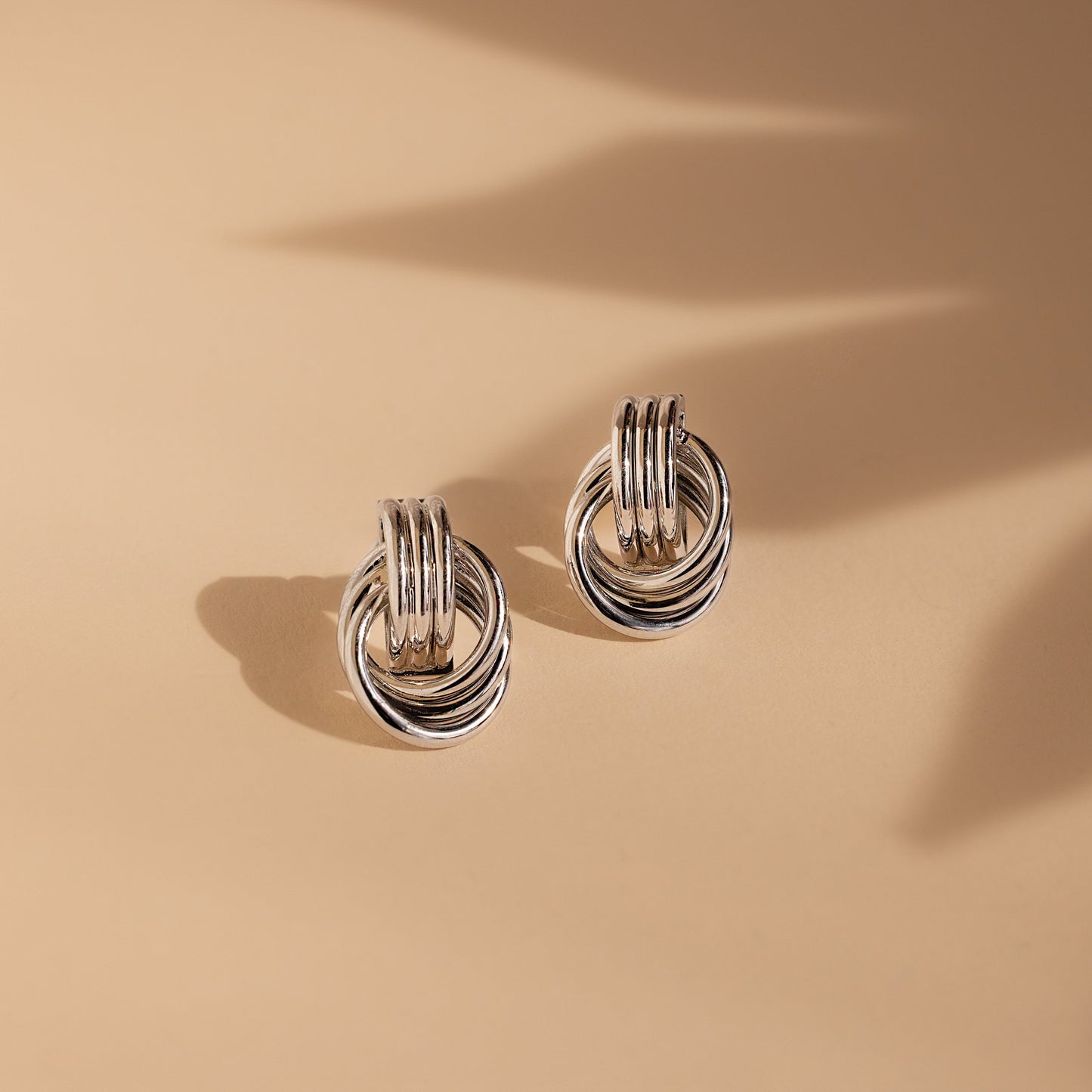 Pendientes de triple nudo