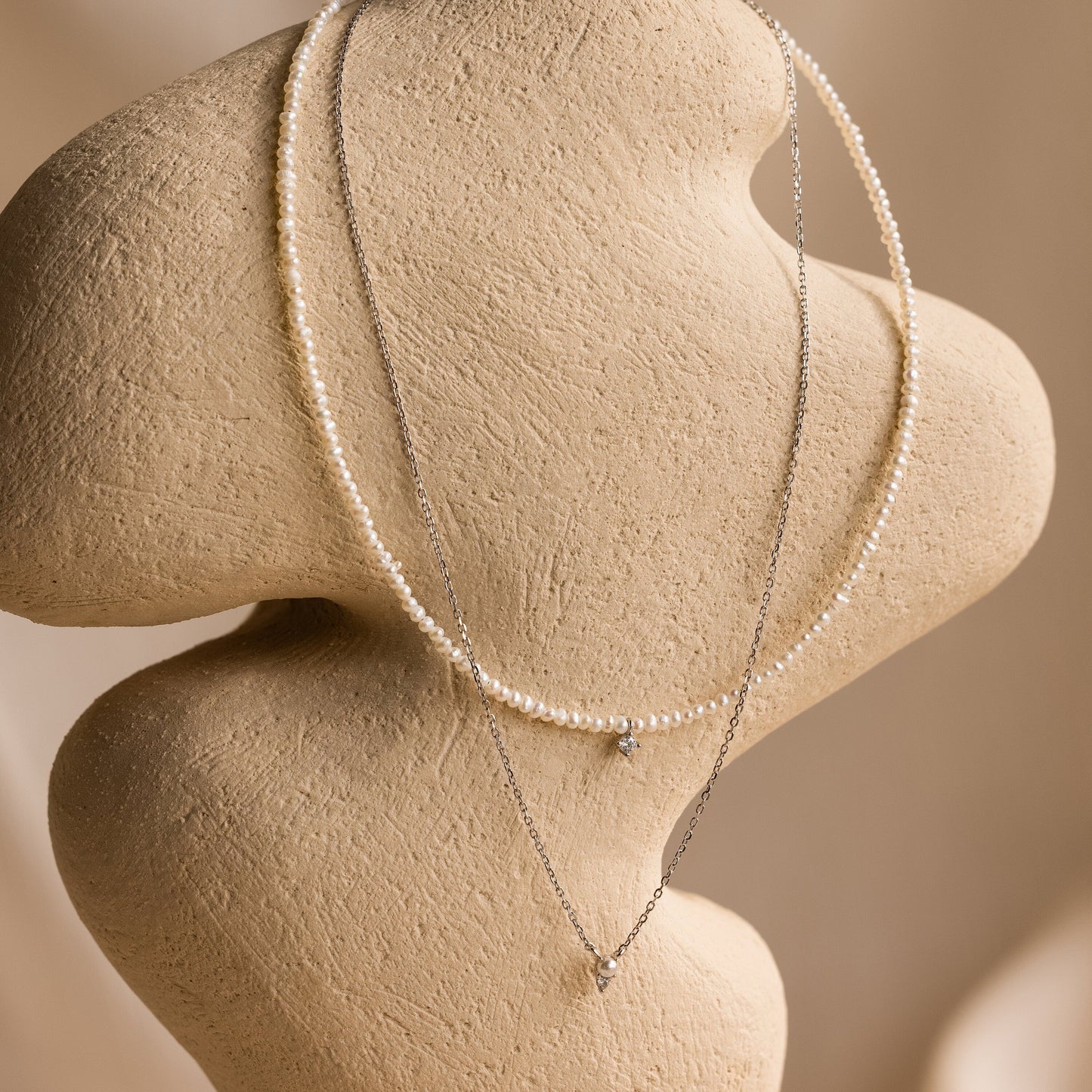 Collar dúo de perlas y diamantes