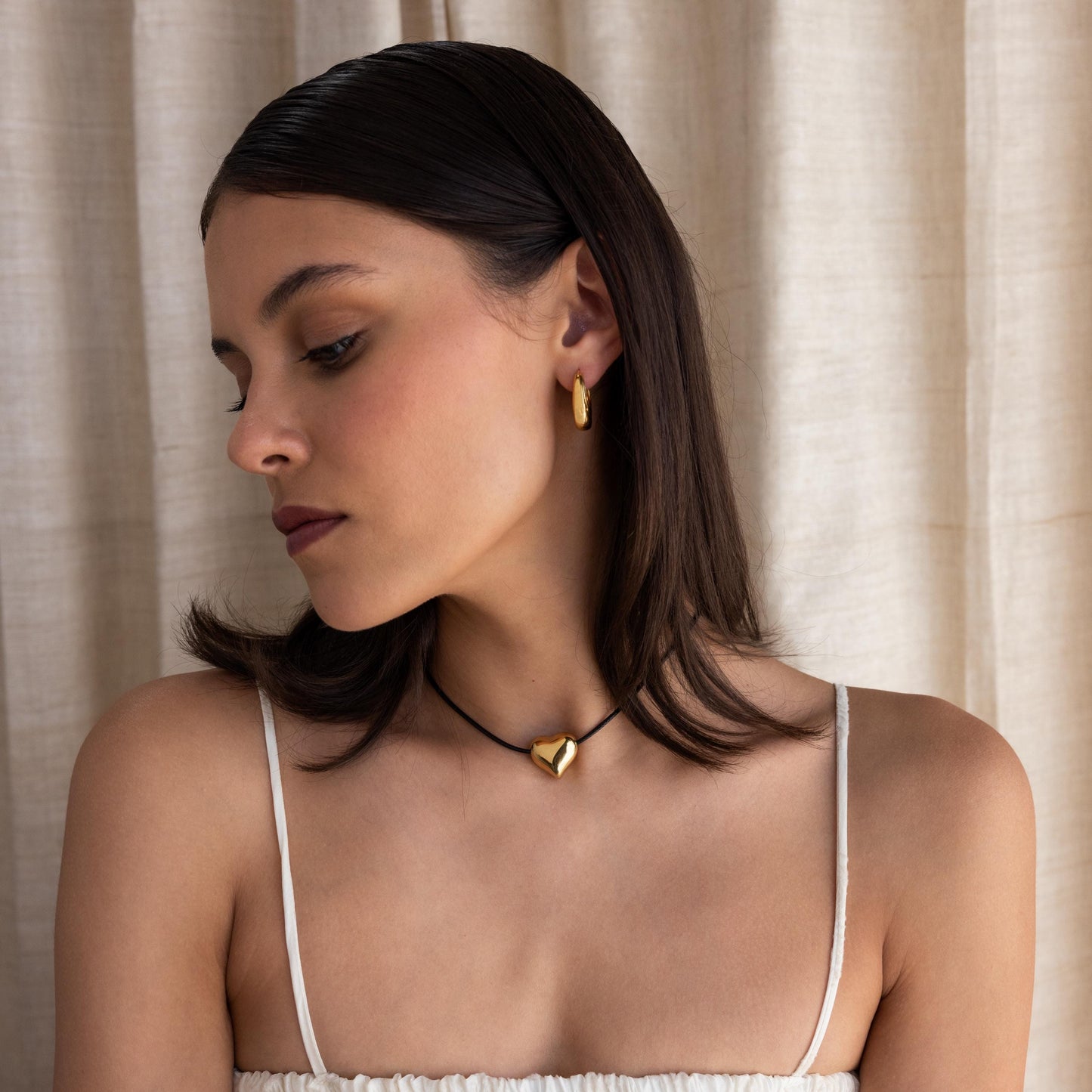 Collar de corazón abullonado grueso