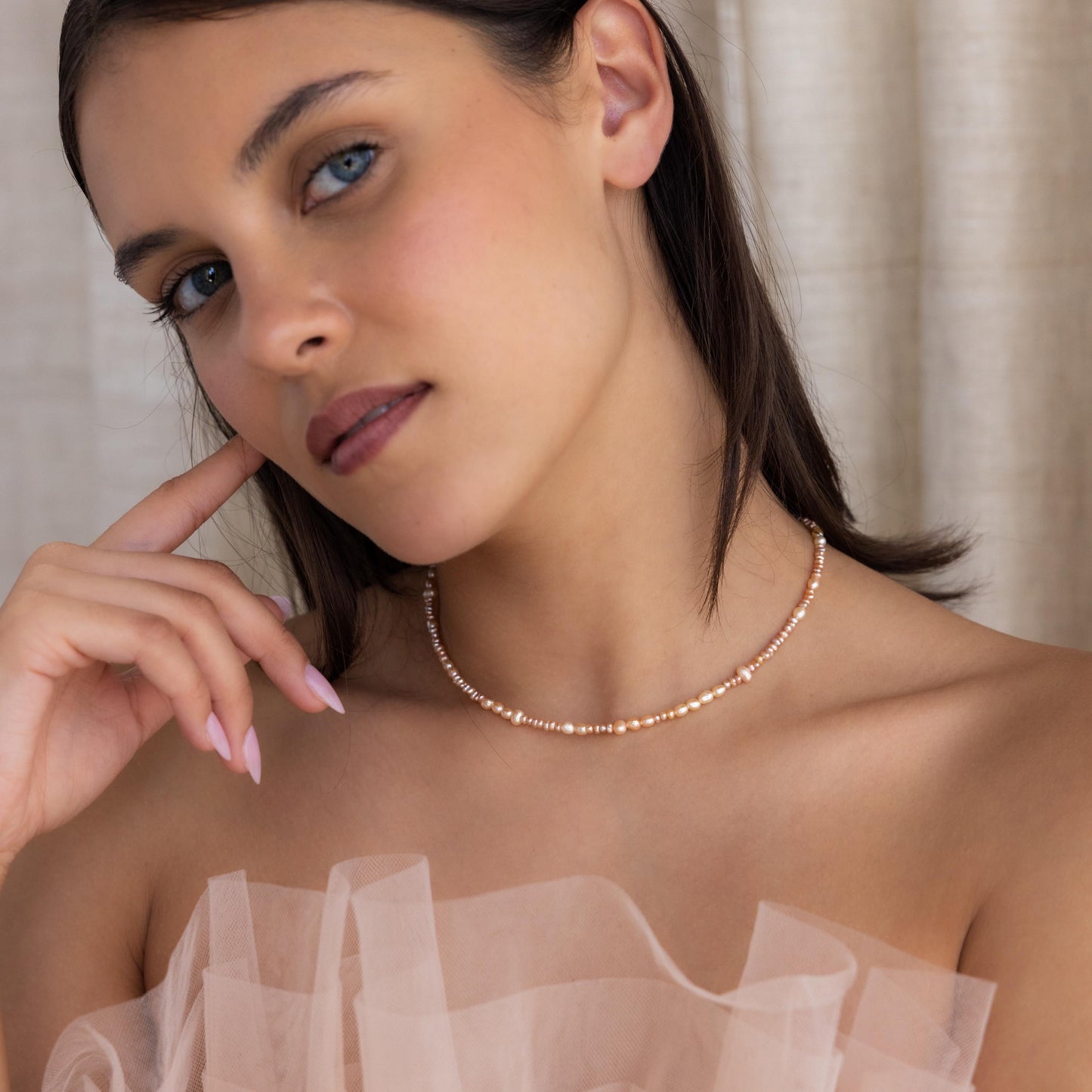 Collar de perlas ruborizadas