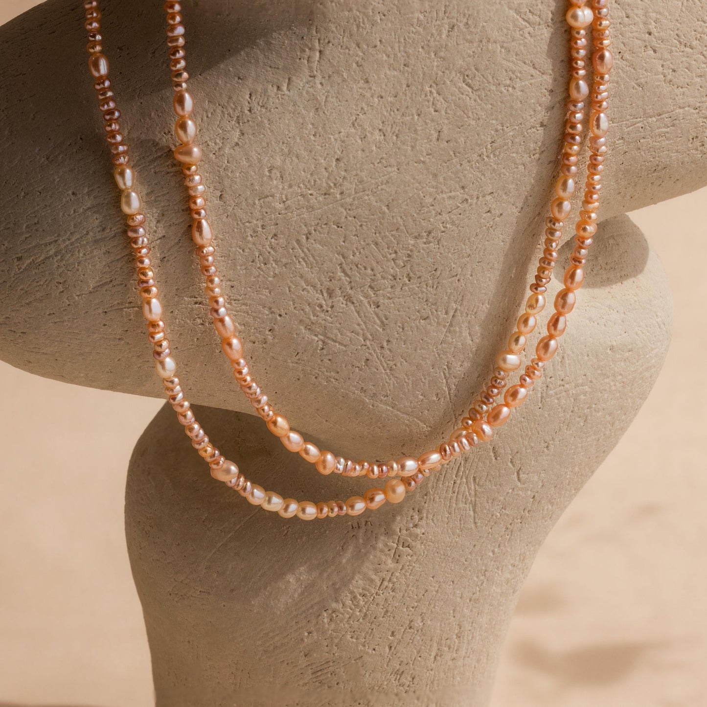 Collar de perlas ruborizadas
