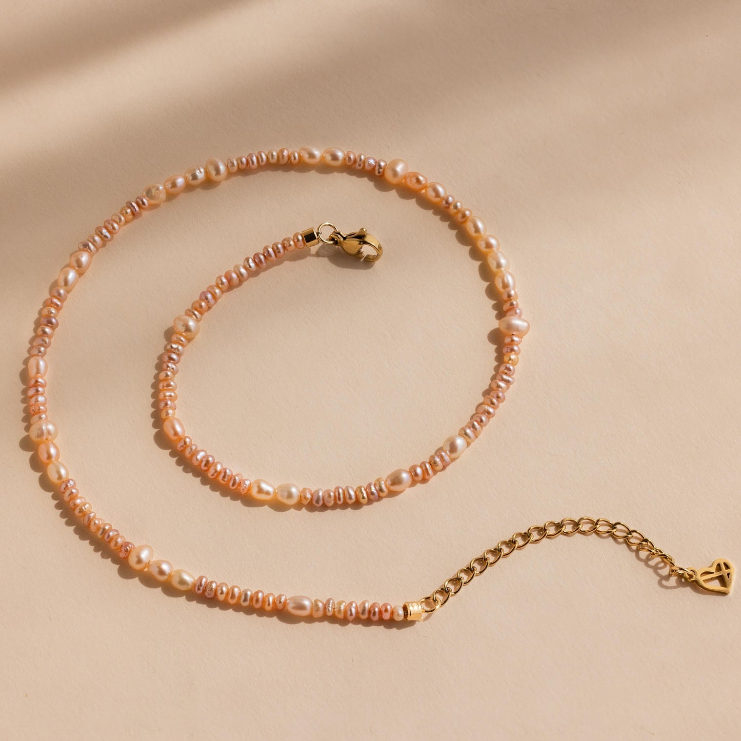 Collar de perlas ruborizadas