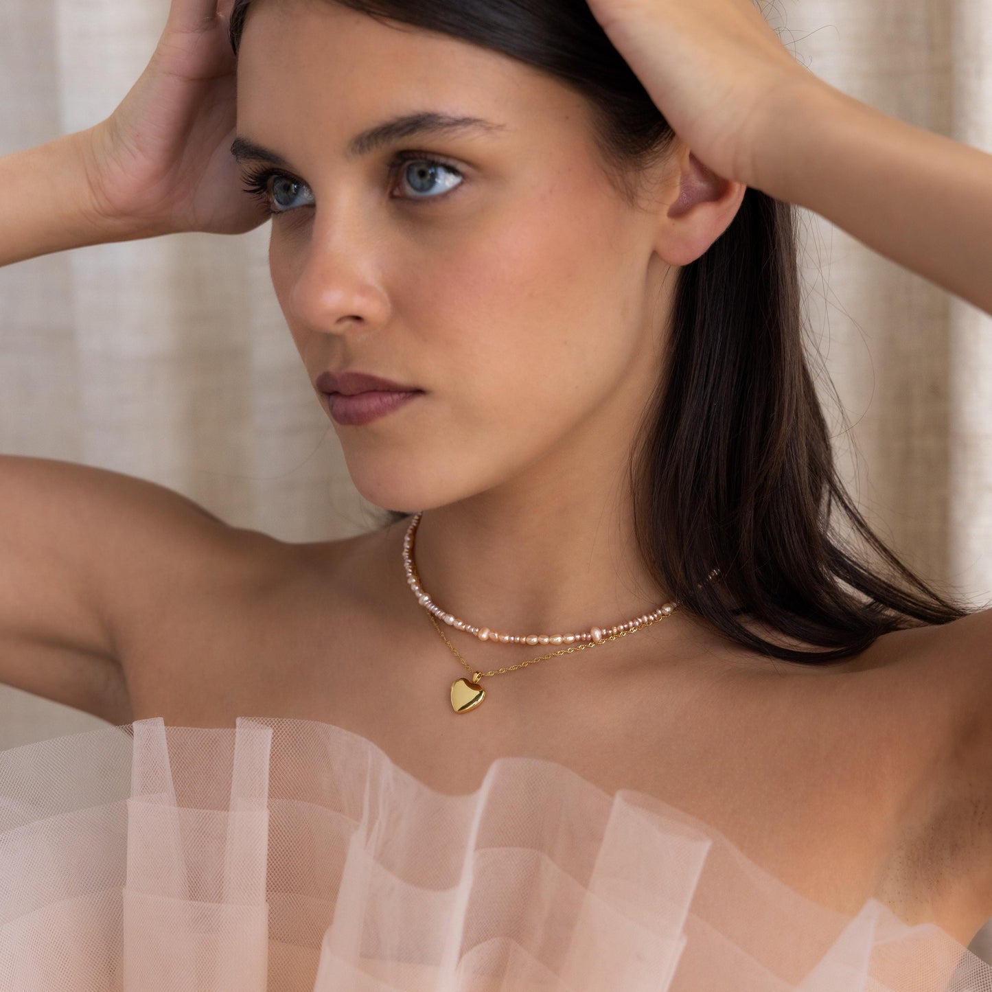 Collar de perlas ruborizadas