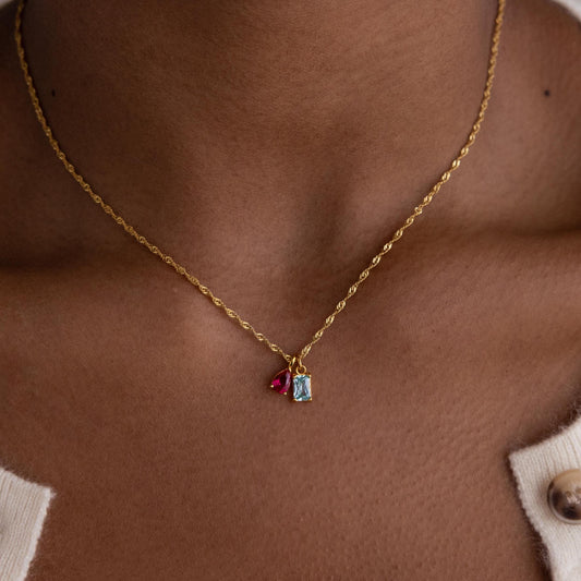 Juego de dijes de piedra natal de pera y baguette