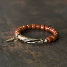Buddha Stones Copper Fish Bone Healing Bracelet: A Journey Through Time