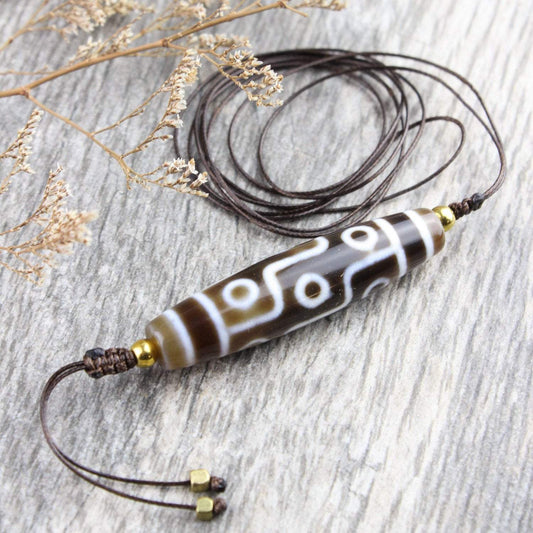 The Spiritual Significance of the Nine Eye Dzi Bead