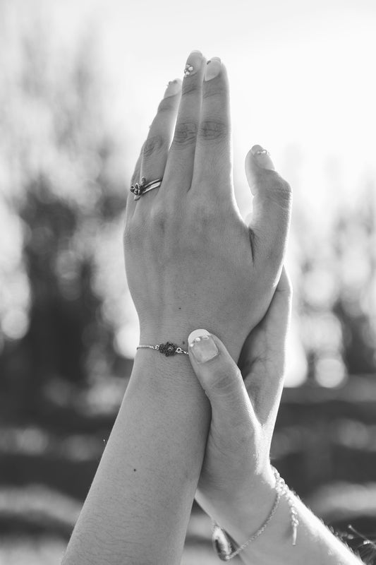 a person holding their hand up in the air
