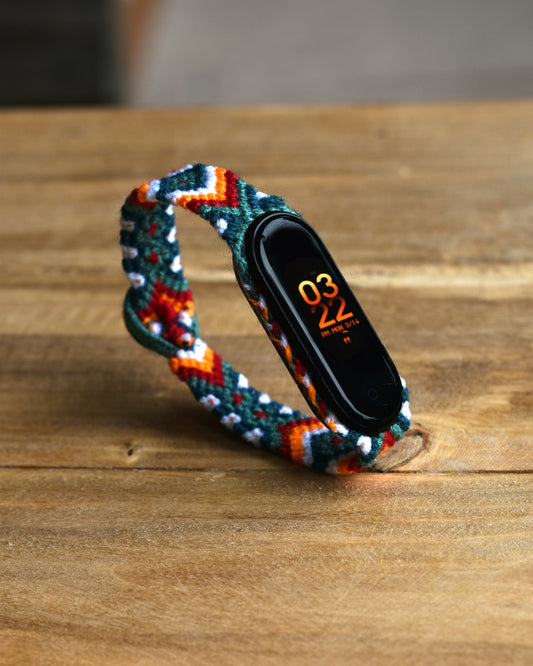 a colorful snake on a wood surface