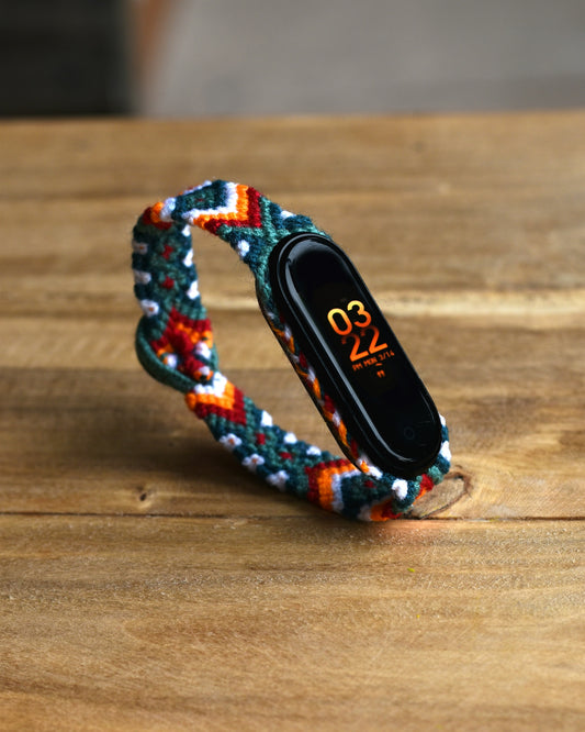 a colorful snake on a wood surface