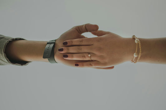 a couple of people that are holding hands